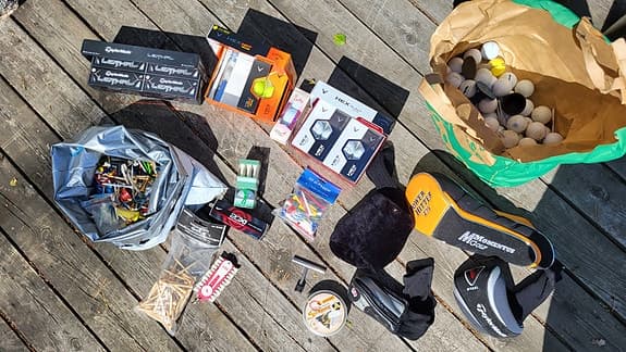 Div golfprylar, bollar, peggar m.m.