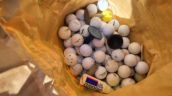 Div golfprylar, bollar, peggar m.m.