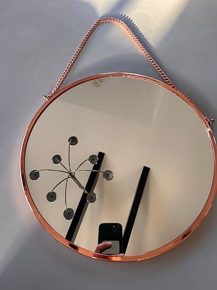 Väggspegel i koppar