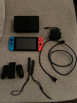 Nintendo Switch Spelkonsol med Joy-Con-kontroller blå och röd