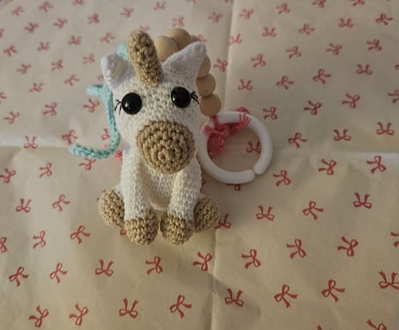 Handmade barnvagnshänge med enhörning