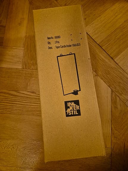 Spegel med ljushållare