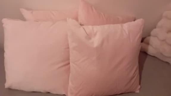 Fyra stycken ljusrosa kuddfodral Sanela från Ikea