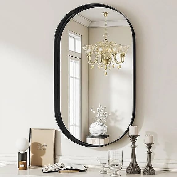 Väggspegel oval svart och guld