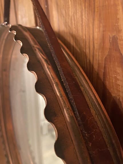 Väggspegel i koppar