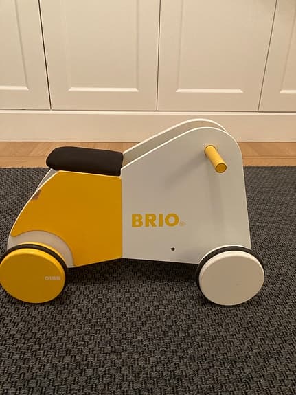 BRIO Barnleksak Gåcykel i trä gul och vit