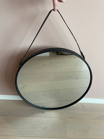 Rund spegel med svart ram