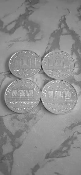 4 stycken x 1 oz österrikiska Vienna Philharmonic silvermynt
