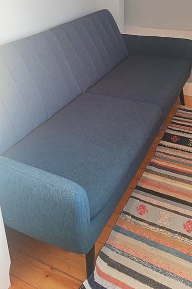 Blå tygsoffa