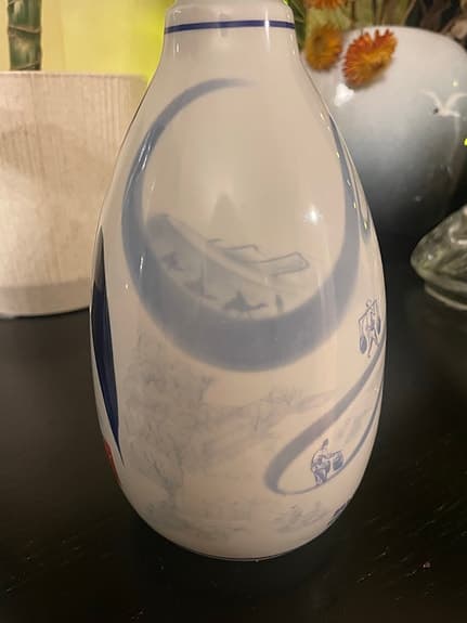 Ljusstake gjord av kinesisk spritflaska