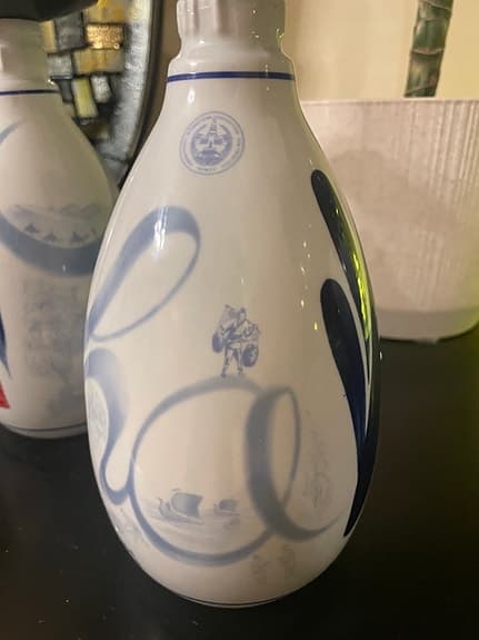 Ljusstake gjord av kinesisk spritflaska