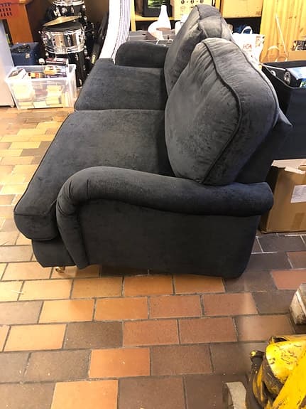 Svart howardsoffa