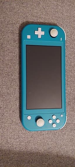 Nintendo Switch Lite Turkos + Super Mario Odyssey + Original laddare i