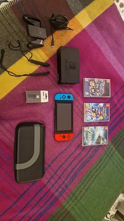 Nintendo Switch + 5 spel och fler tillbehör