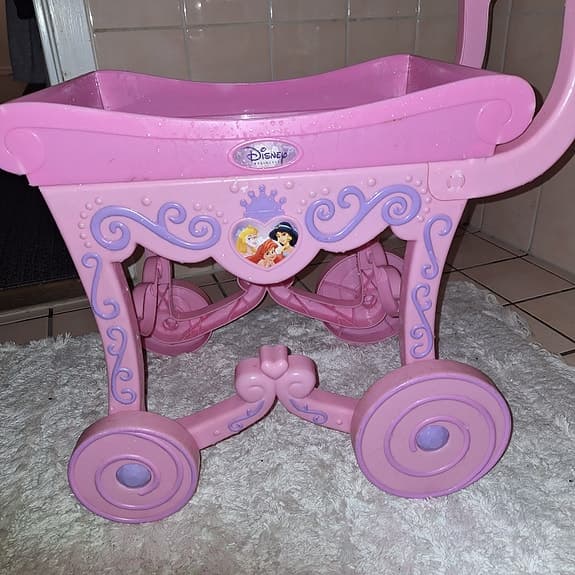 Disney dockvagn rosa
