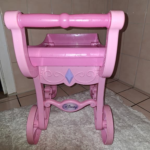 Disney dockvagn rosa