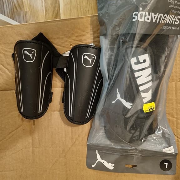 Puma benskydd svart barn stl