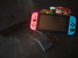 Nintendo Switch spelkonsol neonblå och neonröd