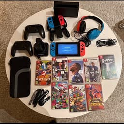 Nintendo Switch spelkonsol med spel kontroller mm