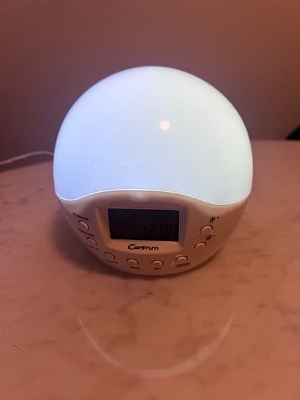 Centrum väckarklockan med ljus