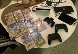 Nintendo Switch OLED - White + 2 Pro Controller och 9 spel.