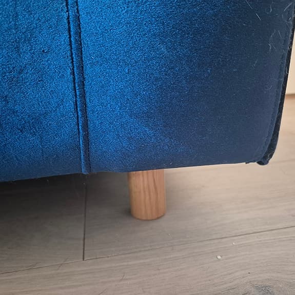 Blå soffa med puff från Sofacompany