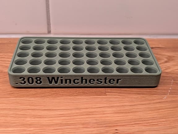 308 Winchester - laddbricka