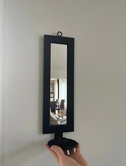 Väggspegel med ljushållare