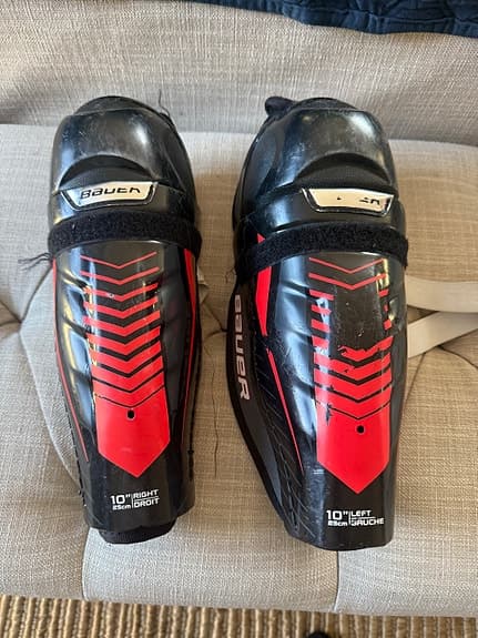 Bauer Lil Sport benskydd ishockey yth stl Lsvart röd