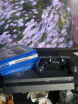 Sony Playstation 4 spelkonsol svart med handkontroll och spel