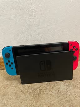 Nintendo Switch spelkonsol neon röd/blå med docka