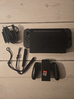 Nintendo Switch spelkonsol med Joy-Con och Mario Kart 8 Deluxe