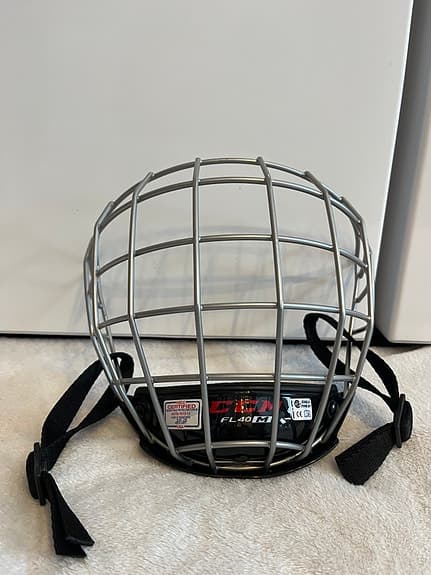 FYNDA Hockeyhjälm CCM marinblå medium inkl galler