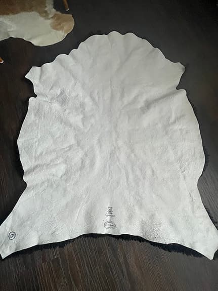 Fårskinn/pläd