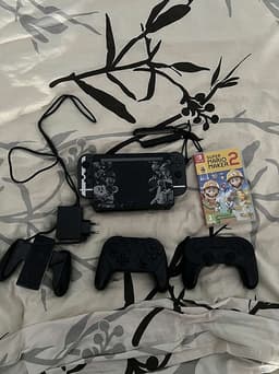 Nintendo Switch + 2 Spel & 2 kontroller