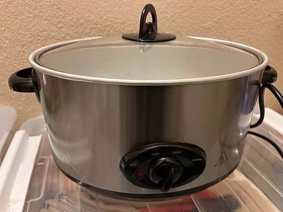 Duka slowcooker rostfri med glaslock