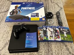 Sony Playstation 4 spelkonsol med handkontroll och  5 st spel