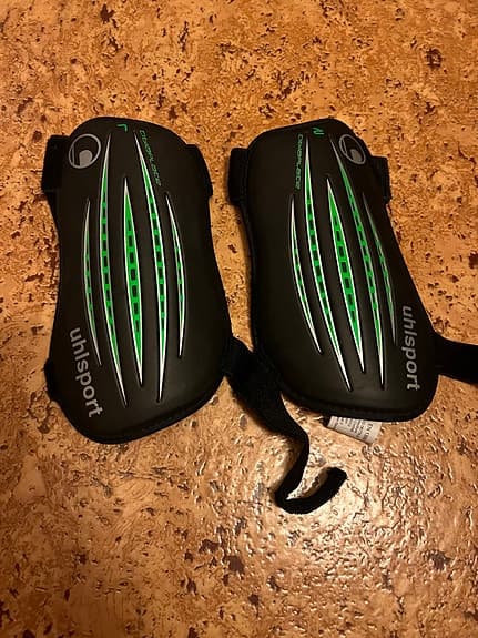 Uhlsport benskydd svart grön