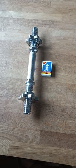 Hantelstång med viktlås.