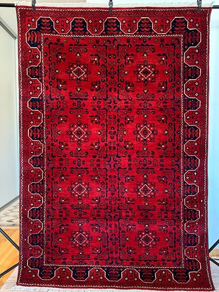 Äkta handknutten matta röd mönstrad