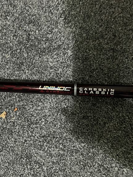 Unihoc Carbskin Classic innebandyklubba röd