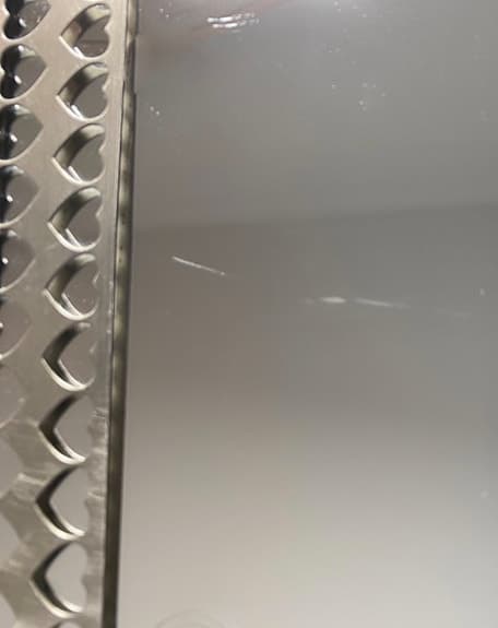 Spegel med hjärtram i metall