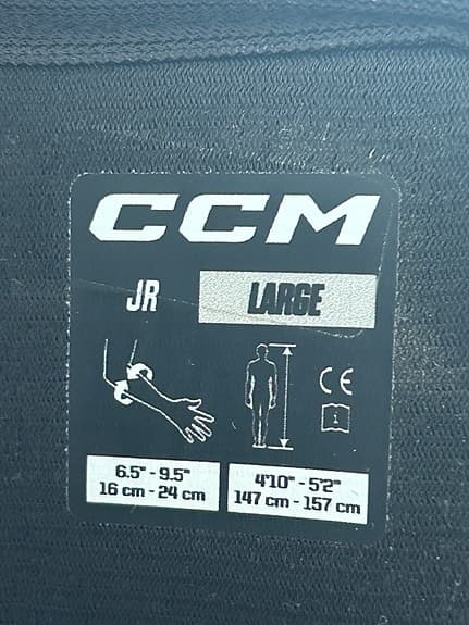 CCM JR Large ishockeyskydd armbågsskydd svart gul