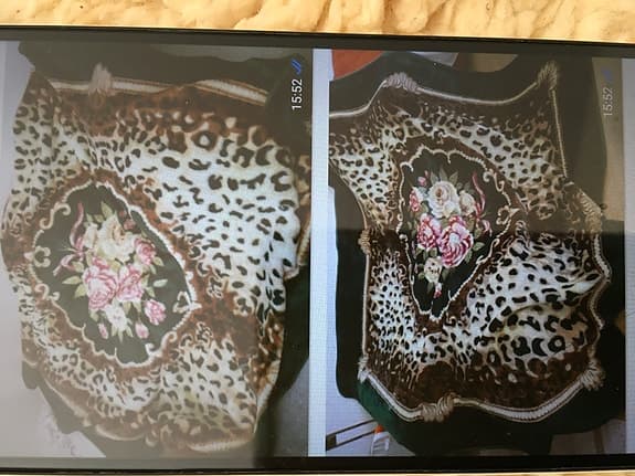 Leopardmönsad pläd med blommor
