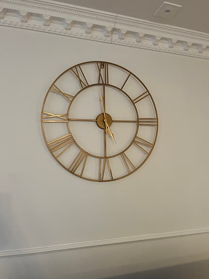 Mio väggklocka metall guld