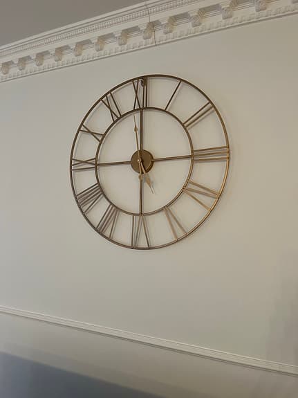 Mio väggklocka metall guld