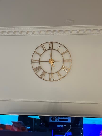 Mio väggklocka metall guld