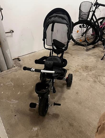 Trehjuling med skjutstång och sufflett grå