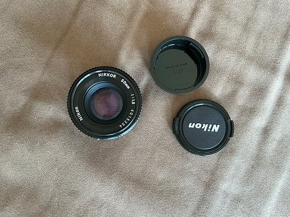 Nikon AI-s 50/1.8 pannkaksobjektiv senaste versionen som nytt