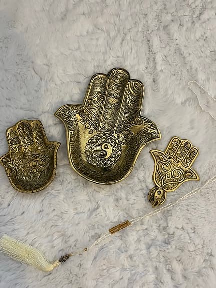 Hamsa hand mässingsfärgade